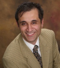 Dr. Guy Gunacar DDS, Dentist