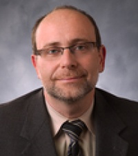 Dr. Eugene  Tolunsky MD
