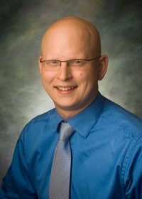 Dr. Andrew  Larsen M.D.