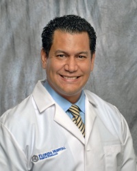 Dr. Giovanni Jubiz, MD, PhD, FACOG, FCRI., OB-GYN (Obstetrician-Gynecologist)