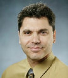 Dr. Luigi  Simone  M.D.