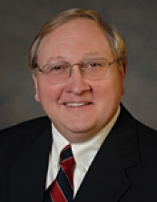 Dr. John E. Szewczyk  M.D.
