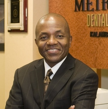 Dr. Kalambayi Tshiyombo Kabasela, DDS, FICD, Prosthodontist