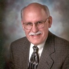 Dr. Mark Calvin Rowley  M.D.