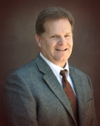 Dr. Kris  Huber D.C.