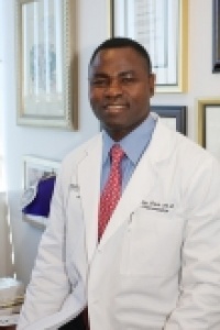 Dr. Amos  Dare M.D.