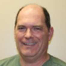 Dr. John Marvin Isbrandt D.D.S., Dentist