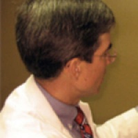 Dr. Melburn Kenton Huebner MD