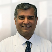 Dr. Gurbir Paul Tiwana D.M.D. M.D. M.S.