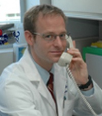 Dr. Travis  Tollefson M.D.