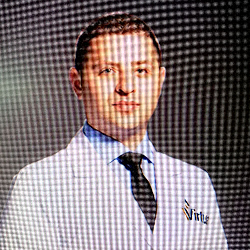 Eduard Koman, MD, MBA, FACC, Nuclear Medicine Specialist