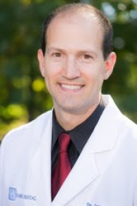 Dr. James E Dores DMD, Dentist
