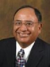 Dr. Justino  Silvestre MD