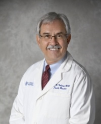 Dr. John  Treharne MD