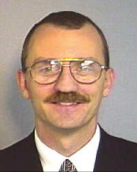 Dr. Zbigniew  Purzycki M.D.