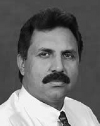 Dr. Maninder Singh Guram M.D.