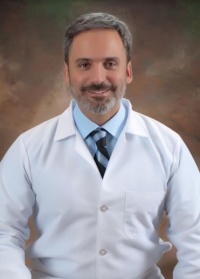 Dr. Carlos A. Pulido MD