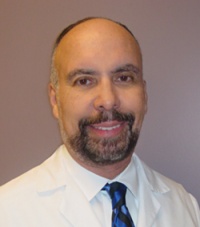 Dr. Earl A Walker M.D., Dermapathologist