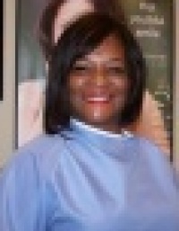 Dr. Marie A. Holliday, DMD, FICD, Dentist