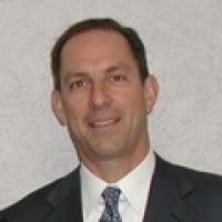 Dr. Andrew  Laster MD