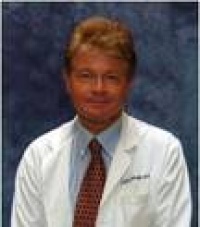 Dr. Charles  Bruhn M.D.