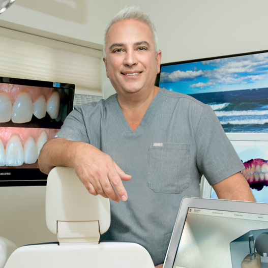 Dr. Robert L. Rioseco, DMD, FAGD, AAACD, Dentist