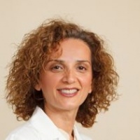 Dr. Dr. Gita Tajick, Dentist