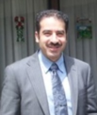 Dr. Elias Y Qare DDS, Dentist