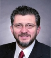 Mr. Carlos  Garberoglio MD
