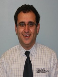 Dr. Samer K Riad DDS