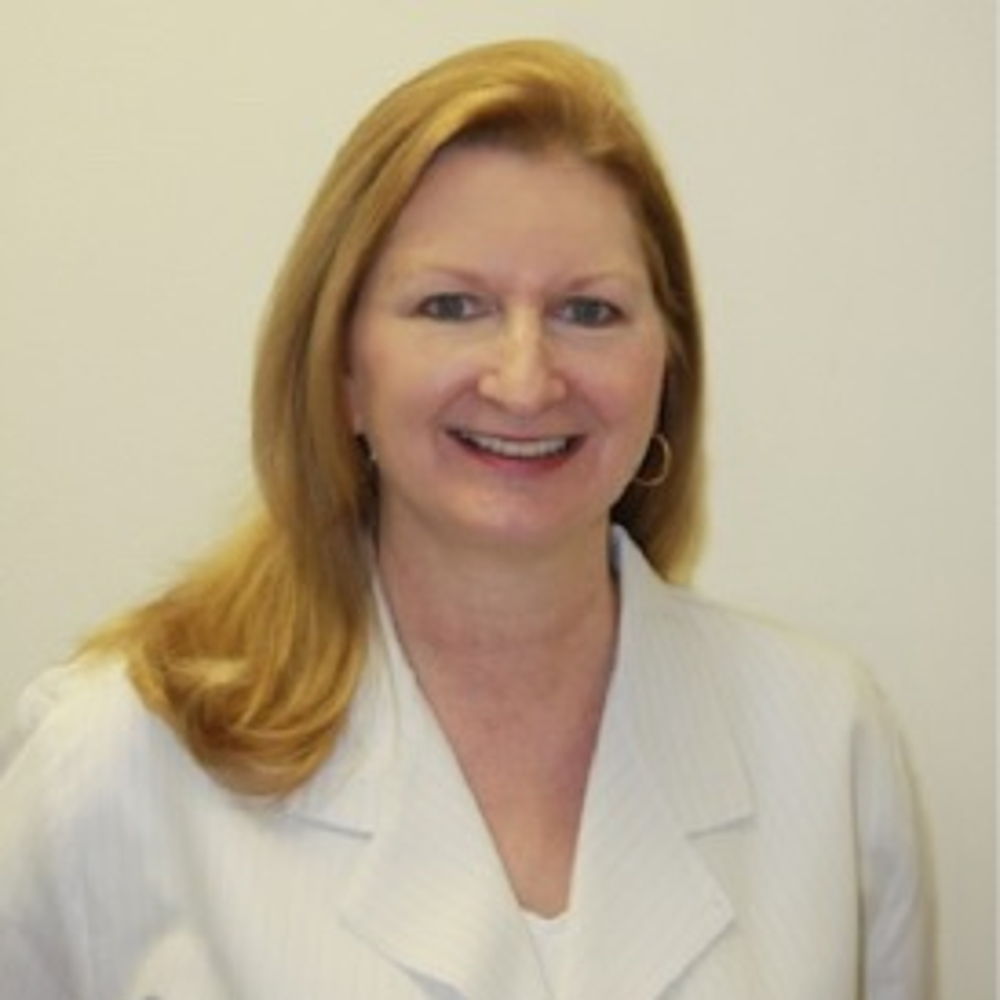 Dr. Erin L Rautio, DMD, Dentist