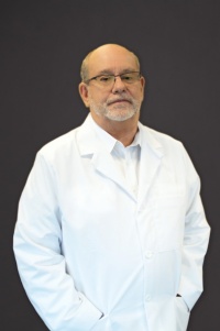 Dr. Charles A Redmond DDS