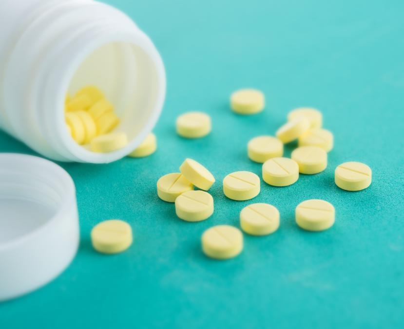 Round and Yellow M 66 Pill