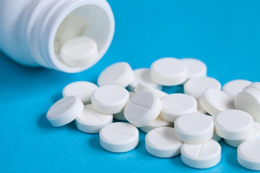 White Colored Round 512 Pill