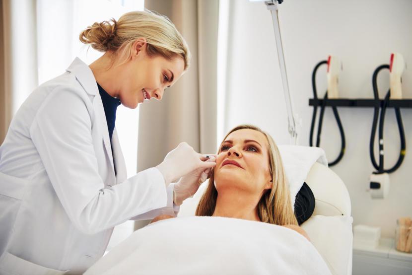 what does a dermatologist visit cost